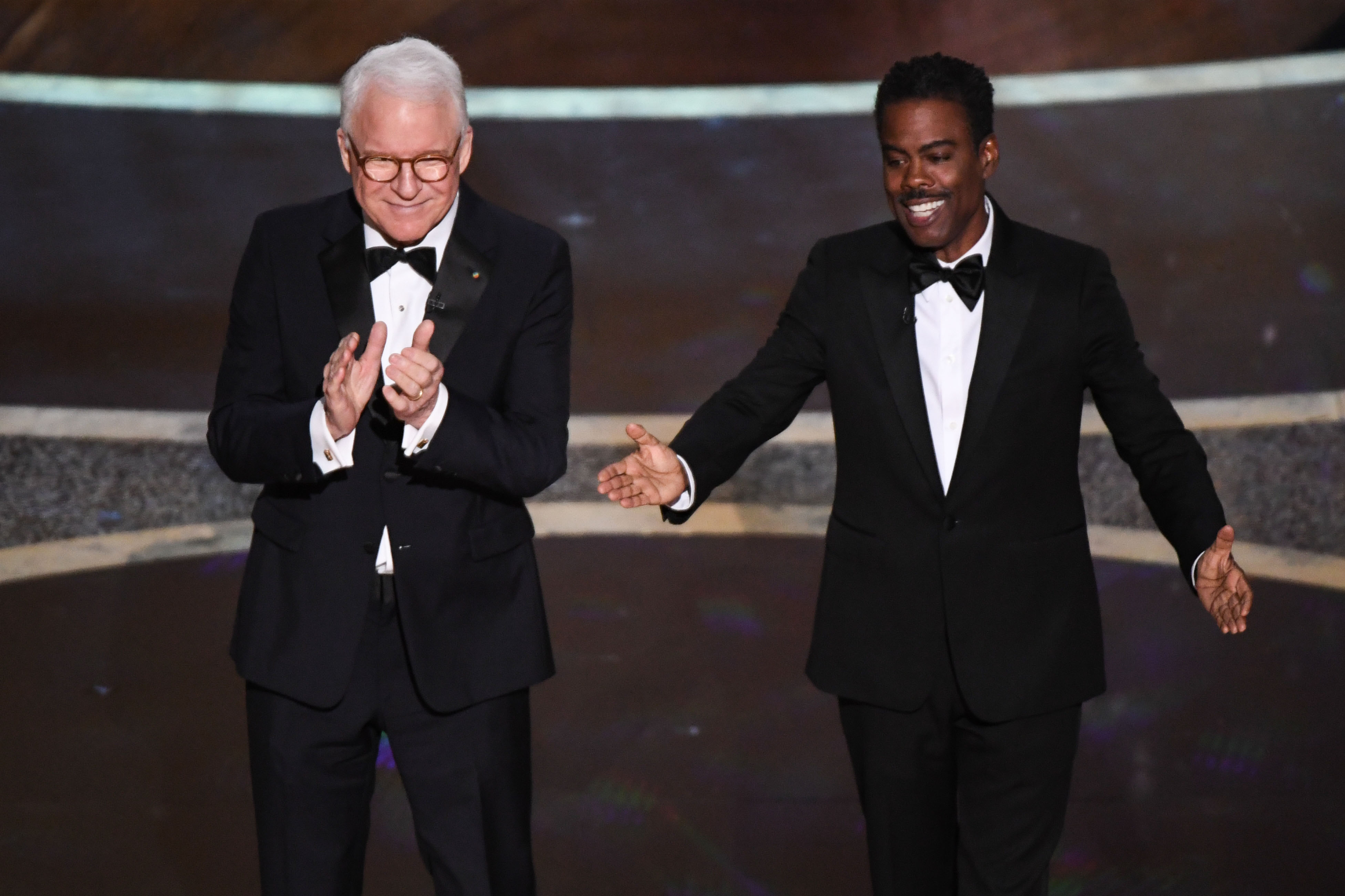 Steve Martin and Chris Rock (R) speak onstage during the 92nd Oscars at the Dolby Theatre in Hollywood, California on Feb. 9, 2020.