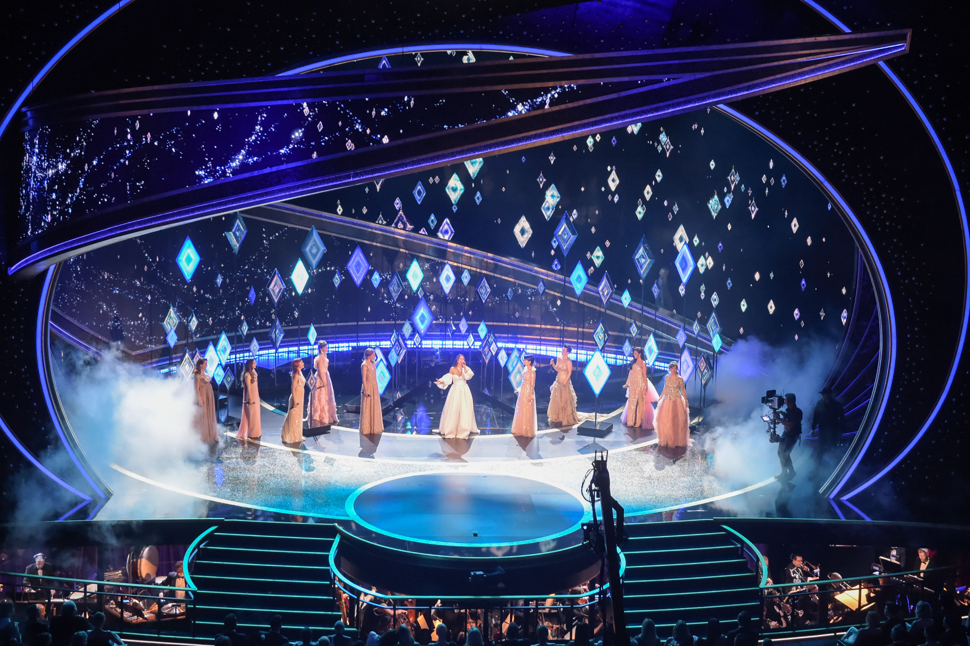 Idina Menzel and Elsa voice actresses perform onstage during the 92nd Oscars at the Dolby Theatre in Hollywood, California on Feb. 9, 2020.