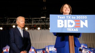 File photo - Sen. Amy Klobuchar (D-MN) joins Democratic presidential candidate former Vice President Joe Biden on stage during a campaign event on March 2, 2020, in Dallas.