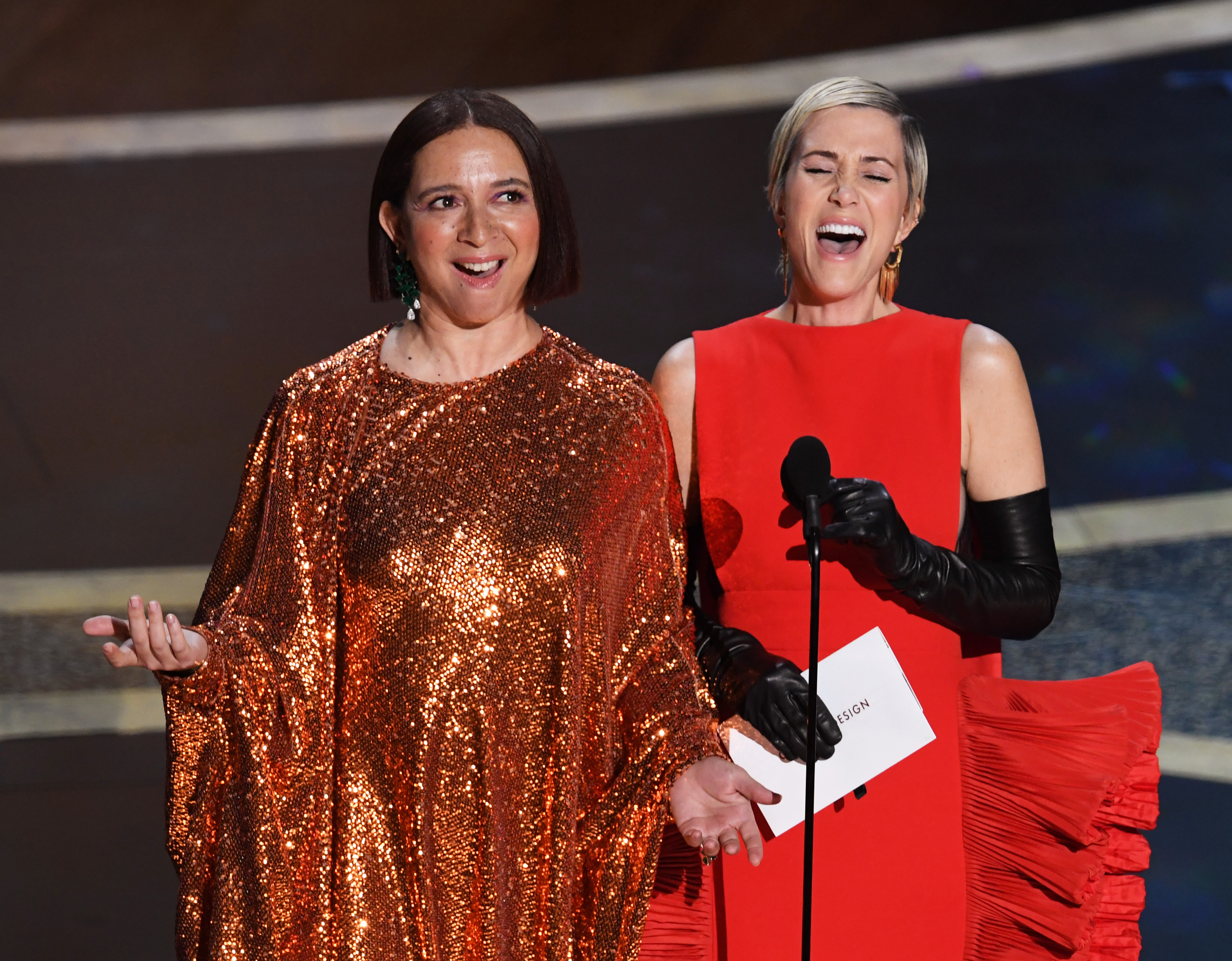 (L-R) Maya Rudolph and  Kristen Wiig speak onstage during the 92nd Annual Academy Awards at Dolby Theatre on Feb. 9, 2020 in Hollywood, California.