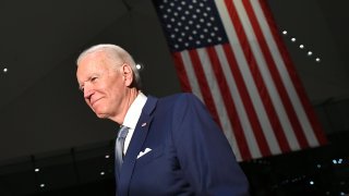 In this March 10, 2020, file photo, Democratic presidential hopeful former Vice President Joe Biden walks out after speaking at the National Constitution Center in Philadelphia, Pennsylvania.