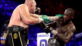 Tyson Fury Punches Deontay Wilder