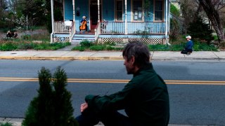 Cellist playing on Maryland porch