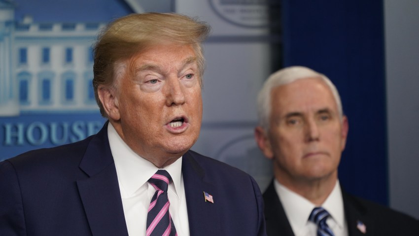 U.S. President Donald Trump speaks as Vice President Mike Pence listens during a news conference in the White House in Washington, D.C., U.S., on Friday, April 24, 2020. Trump has been determined to talk his way through the coronavirus crisis, but his frequent misstatements at his daily news conferences have caused a litany of public health and political headaches for the White House.