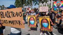 People protest against the death of George Floyd and others in police custody, as they support the Black Lives Matter movement outside the Hall of Justice in Los Angeles, California on June 24, 2020. (Photo by Mark RALSTON / AFP) (Photo by MARK RALSTON/AFP via Getty Images)