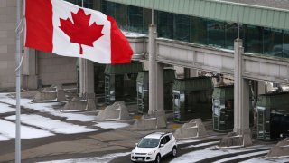 A vehicle makes its way through the Canadian border crossing