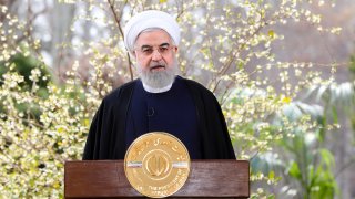 In this photo released by the official website of the office of the Iranian Presidency, on Friday March 20, 2020, President Hassan Rouhani delivers a message for the Iranian New Year, or Nowruz, in Tehran, Iran. Supreme Leader Ayatollah Ali Khamenei and President Hassan Rouhani in separate new year messages vowed to overcome the coronavirus and increase economic growth.