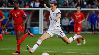 In this Feb. 9, 2020, file photo, U.S. forward Megan Rapinoe scores against Canada during the second half of a CONCACAF women's Olympic qualifying soccer match in Carson, Calif.