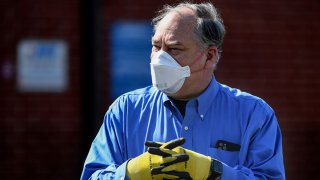 Montgomery County Executive Marc Elrich at the Vehicle Emissions Inspection Program Station in White Oak to discuss the COVID-19 drive thru testing site April 7, 2020.