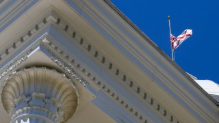 The Alabama flag flies over the the Alabama State Capitol on May 15, 2019 in Montgomery, Alabama.