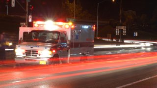 ambulance-highway-night-shutterstock_403809555