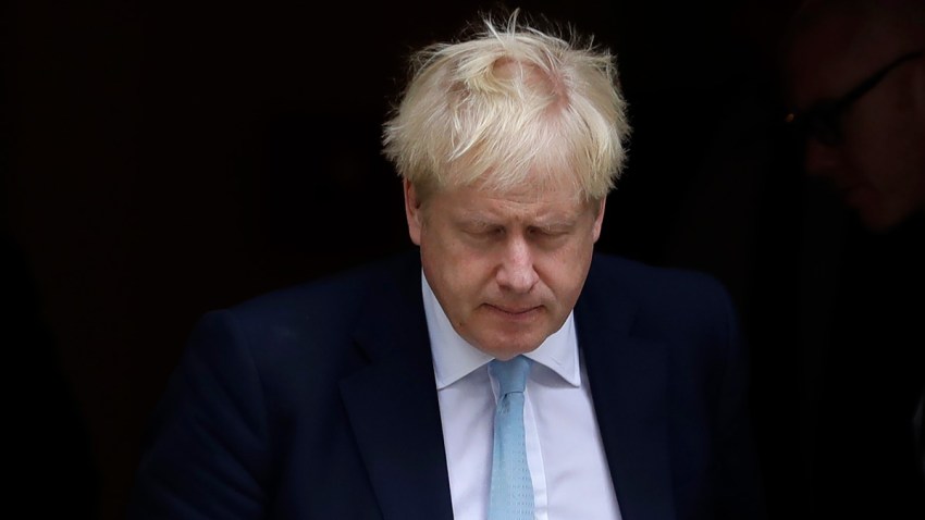 In this Oct. 3, 2019, file photo, Britain's Prime Minister Boris Johnson leaves Downing Street to attend Parliament in London.