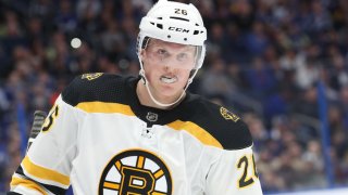 This Dec 6, 2018, file photo shows Boston Bruins center Colby Cave (26) during the first period at Amalie Arena.