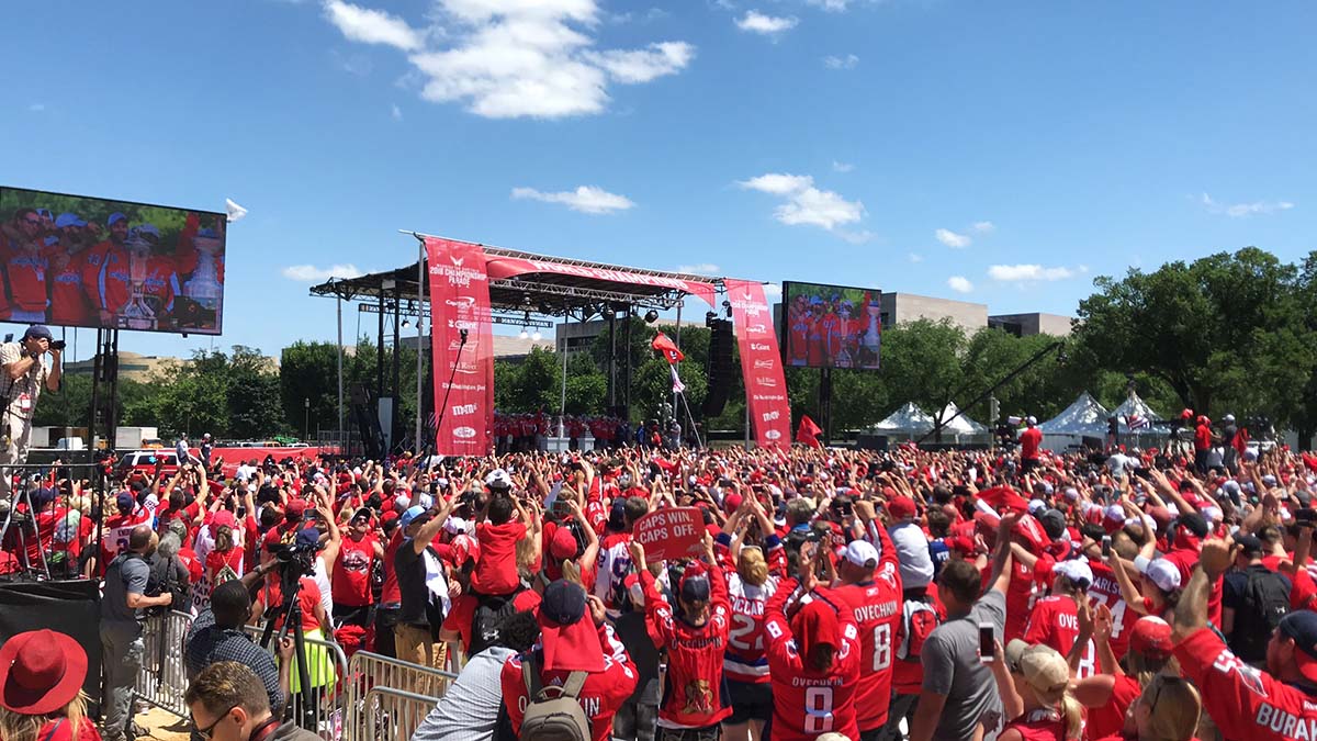 Washington Capitals' T.J. Oshie chugs a beer through his jersey at Stanley  Cup rally 