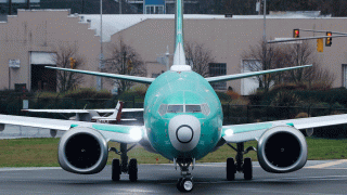 FILE - In this Dec. 11, 2019, file photo, a Boeing 737 Max airplane being built for Norwegian Air International turns as it taxis for take off for a test flight at Renton Municipal Airport in Renton, Wash.