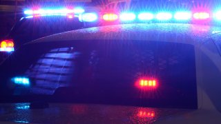police-cars-night-shutterstock_12324768416