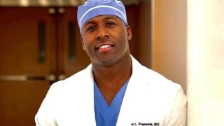This March 30, 2020 photo shows Dr. Elvis Francois at the Mayo Clinic in Rochester, Minn. The orthopedic surgery resident has gone viral thanks to his top-notch musical performances at hospitals. On Friday, the healthcare worker with a golden voice will independently release "Music Is Medicine," which was recorded alongside pianist and fellow resident Dr. William Robinson. All of the proceeds will be donated to The Center of Disaster Philanthropy COVID-19 Response Fund.