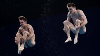 Tom Daley and Matty Lee of Great Britain compete during the men's synchronized 10m platform final.
