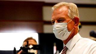 Former Auburn coach, Tommy Tuberville, talks with supporters as they gather at the Renaissance hotel for a watch party in the runoff election between Senator Jeff Sessions and Tommy Tuberville on Tuesday, July 14, in Montgomery, Ala.