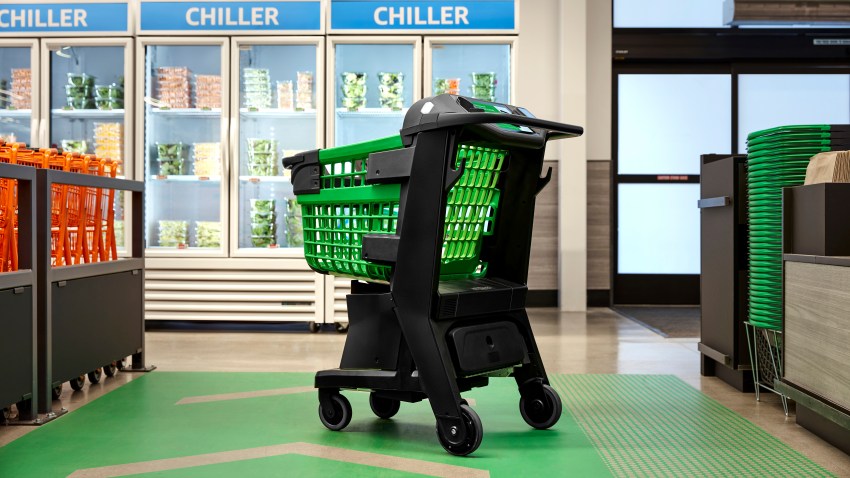 In a photo provided by Amazon, the company's smart shopping cart is seen in spring 2020 in Los Angeles. The cart, which Amazon unveiled Tuesday, uses cameras, sensors and a scale to automatically detect what shoppers drop in.