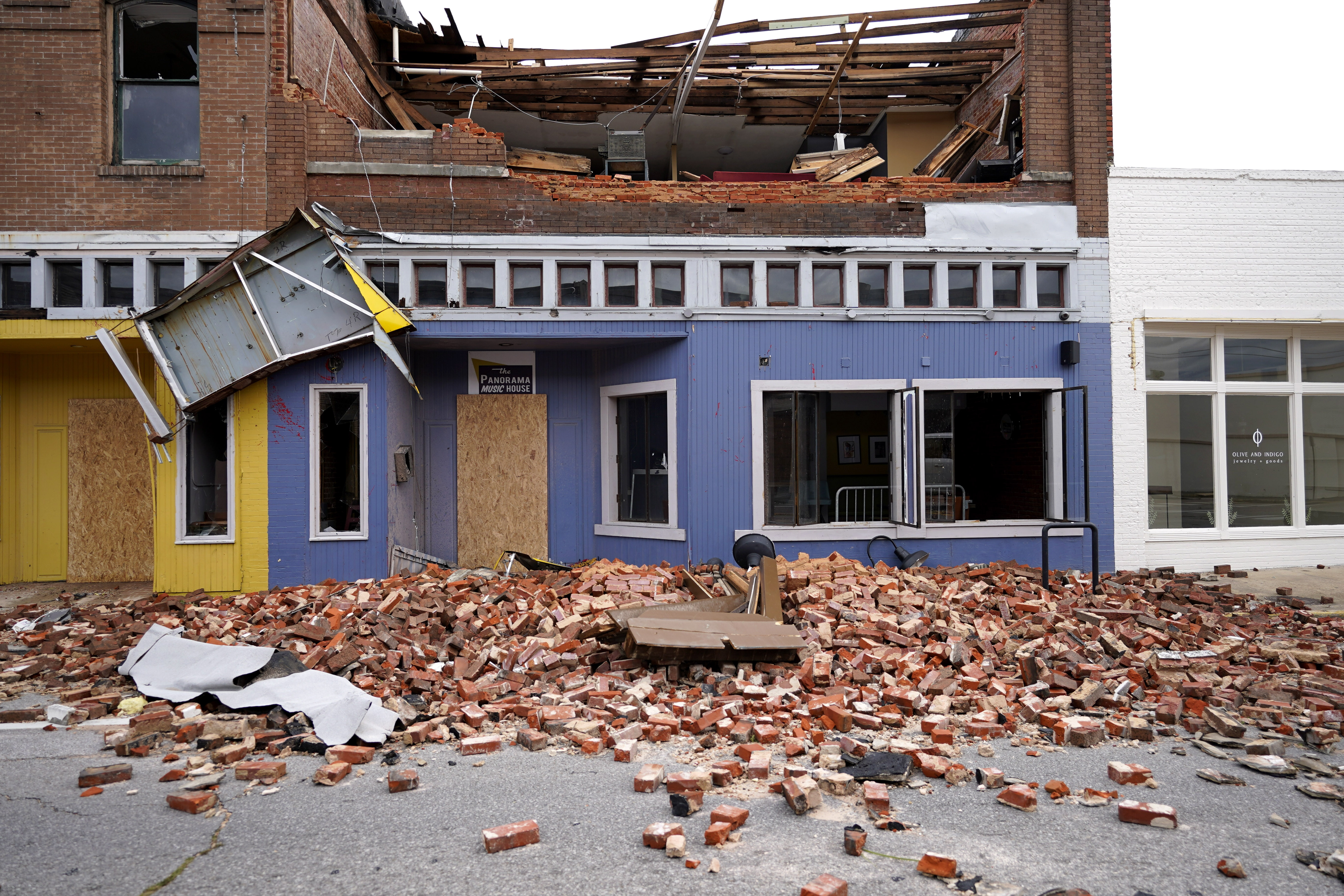 Debris is seen near a business on Thursday, Aug. 27, 2020, in Lake Charles, Louisiana, in the aftermath of Hurricane Laura.