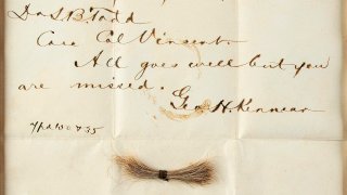 a bloodstained telegram and lock of hair from former President Abraham Lincoln