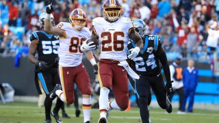 Adrian Peterson runs for a touchdown late in the fourth quarter of a game against the Carolina Panthers at Bank of America Stadium Dec. 1 in Charlotte, North Carolina.