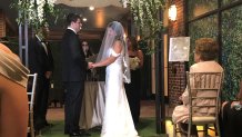 A couple gets married in the courtyard of the Four Seasons after a fire forced the evacuation of the hotel.