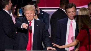 UNITED STATES - NOVEMBER 27: Donald Trump, flanked by campaign manager Paul Manafort and daughter Ivanka, checks the podium early Thursday afternoon in preparation for accepting the GOP nomination to be President at the 2016 Republican National Convention in Cleveland, Ohio on Wednesday July 20, 2016.