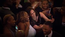 Senator Kamala Harris, a Democrat from California, uses a mobile device to take a selfie photograph with an attendee during the Alpha Kappa Alpha Sorority Inc. Annual Pink Ice Gala in Columbia, South Carolina, U.S., on Friday, Jan. 25, 2019.