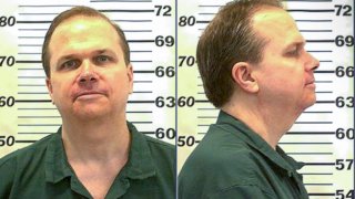 In this handout, American criminal Mark David Chapman in a mug shot taken at the Attica Correctional Facility, July 2010.