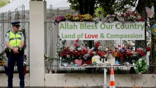 A police officer stands guard outside the Al Noor mosque in Christchurch, New Zealand on March 15, 2020.