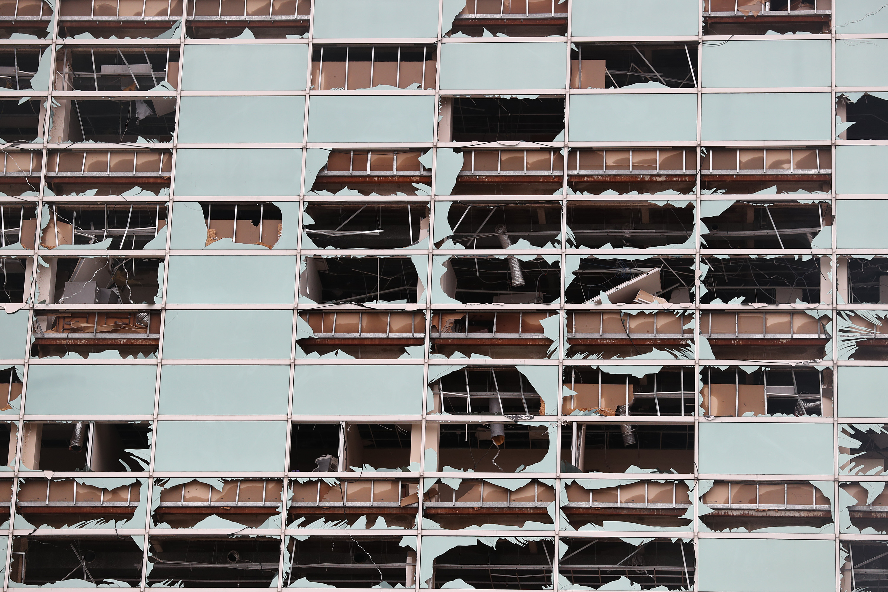 The Capital One Bank Tower is seen with its windows blown out in the downtown area after Hurricane Laura passed through on Aug. 27, 2020, in Lake Charles, Louisiana.