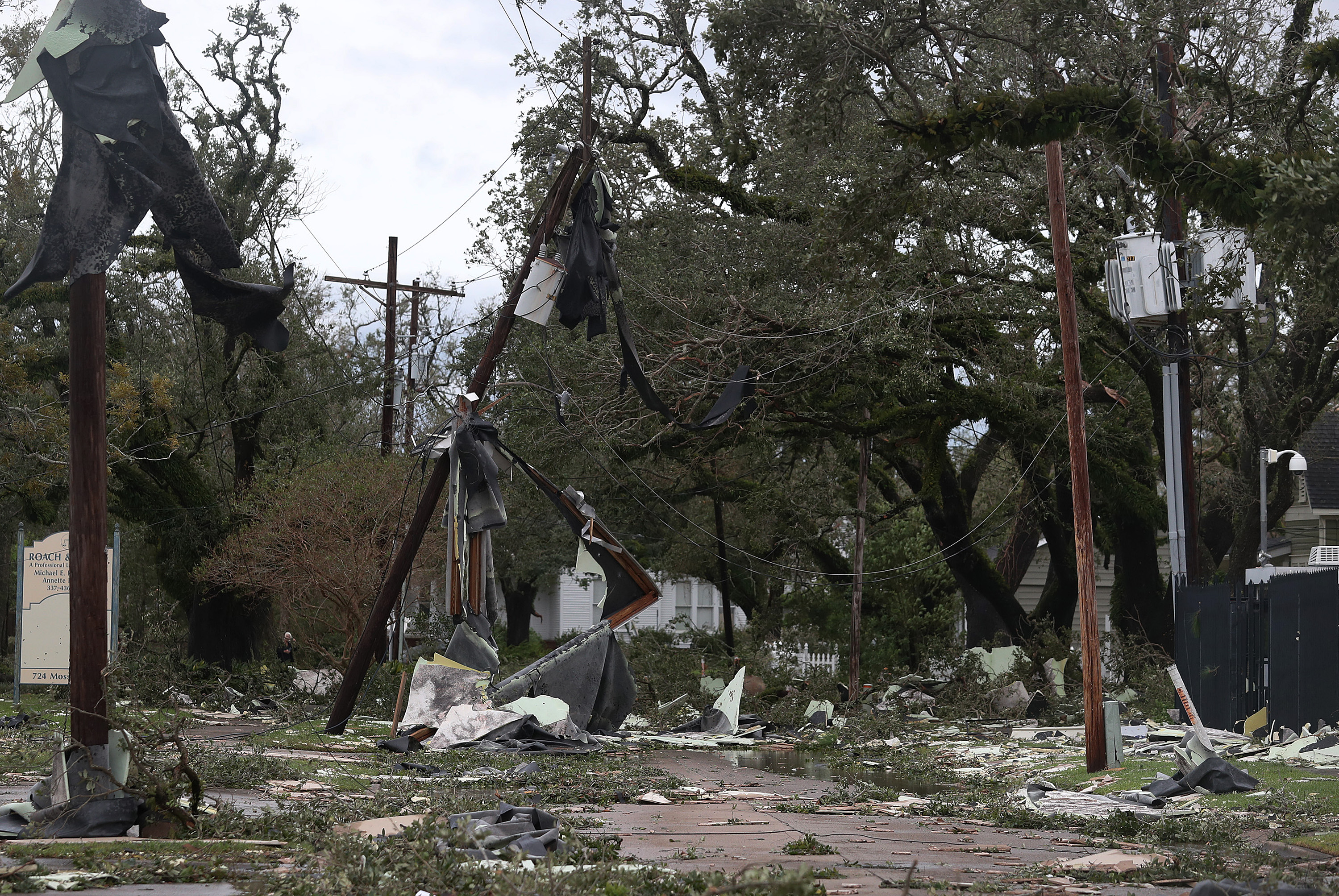 Debris and downed power lines cover a street after Hurricane Laura passed through the area on Aug. 27, 2020 in Lake Charles, Louisiana.