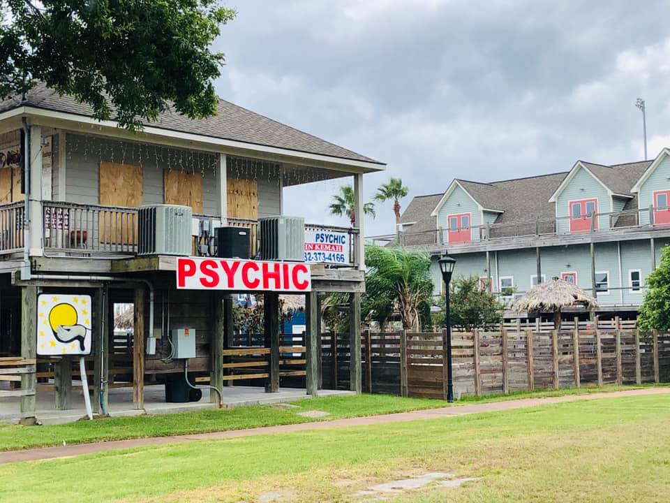 The psychic boarded up&#8230; the business next door did not.