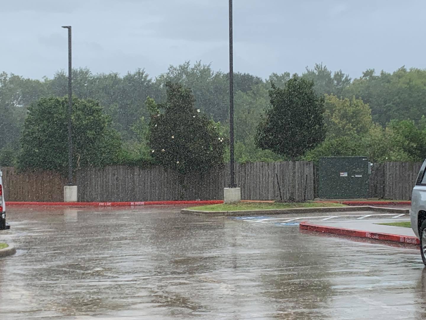 And here comes the rain. This is the parking lot of our hotel in Beaumont.