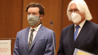 Actor Danny Masterson, left, stands with his attorney, Thomas Mesereau as he is arraigned on rape charges at Los Angeles Superior Court, in Los Angeles, Calif. on Friday, Sept. 18, 2020.