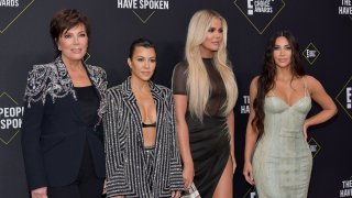 SANTA MONICA, CALIFORNIA - NOVEMBER 10: (L-R) Kris Jenner, Kourtney Kardashian, Khloé Kardashian and Kim Kardashian attend`Kim Kardashian the 2019 E! People's Choice Awards at Barker Hangar on November 10, 2019 in Santa Monica, California.
