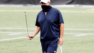 Head coach Bill Belichick of the New England Patriots looks on during training camp at Gillette Stadium on August 28, 2020 in Foxborough, Massachusetts.