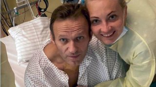 This handout photo published by Russian opposition leader Alexei Navalny on his instagram account shows himself and his wife Yulia posing for a photo in a hospital in Berlin, Germany.