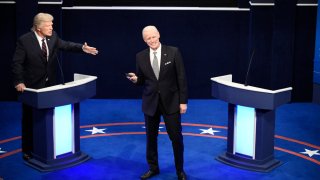 This image released by NBC shows Alec Baldwin as Donald Trump, left, and Jim Carrey as Joe Biden during the "First Debate" Cold Open on "Saturday Night Live" in New York on Oct. 3, 2020.