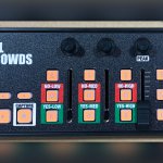 Closeup of a button controller that says "NFL Crowds" on it, and has a cluster of red and green buttons labeled Yes/No, Low/Med/High