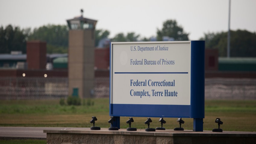 View of a sign outside the Terre Haute Federal Correctional Complex in Indiana.