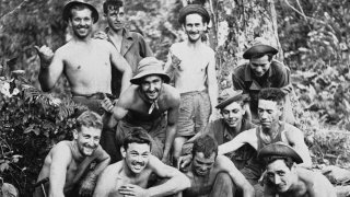 FILE - In this April 3, 1944, file photo, a jungle fighting outfit known as "Merrill's Marauders," pose for a photo in North Burma, now known as Myanmar. The World War II unit that spent months marching and fighting behind enemy lines in Burma has been approved to receive Congress' highest honor.