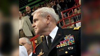 Retired Gen. J.H. Binford Peay III (right) attends an event at U.S. Central Command in this undated photo.