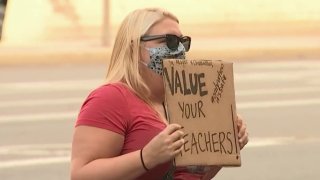 A protester with the teachers union