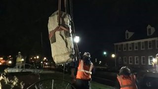 A Confederate monument is removed from outside the Fairfax County Courthouse.