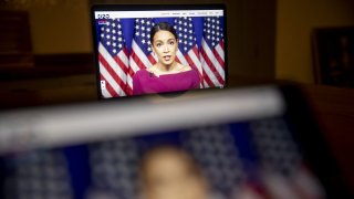Representative Alexandria Ocasio-Cortez, a Democrat from New York, speaks during the virtual Democratic National Convention seen on a laptop computer in Tiskilwa, Illinois, U.S., on Tuesday, Aug. 18, 2020. The DNC, which began Monday and ends Thursday with Joe Biden accepting the nomination for president, will be almost entirely virtual with speakers delivering addresses from around the U.S. that will be streamed on the internet.