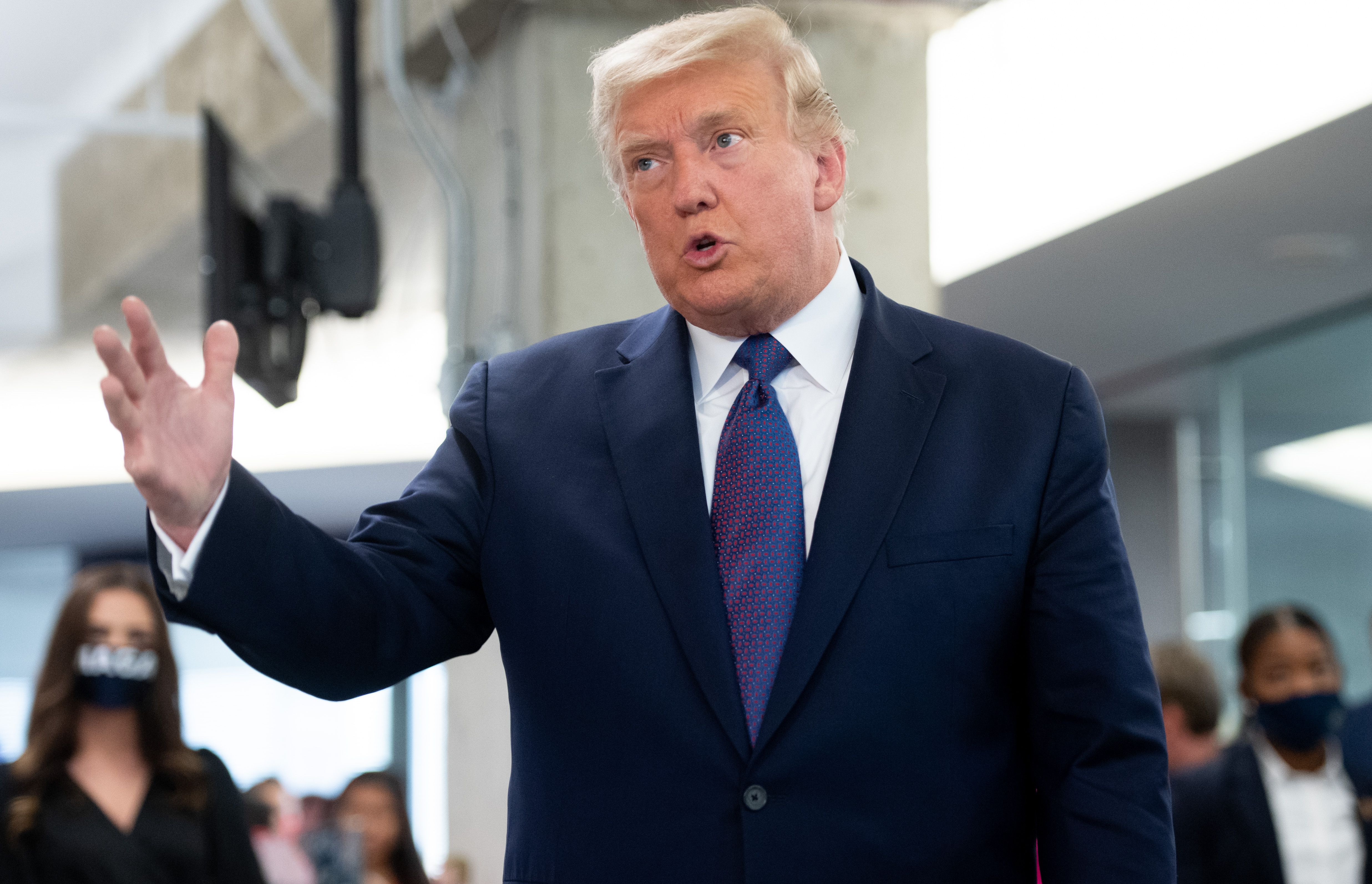 Photos President Donald Trump Visits His Campaign Headquarters in