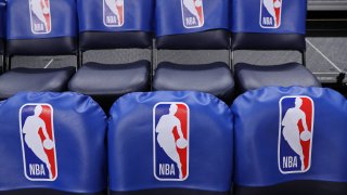 NBA logo on seats in an arena